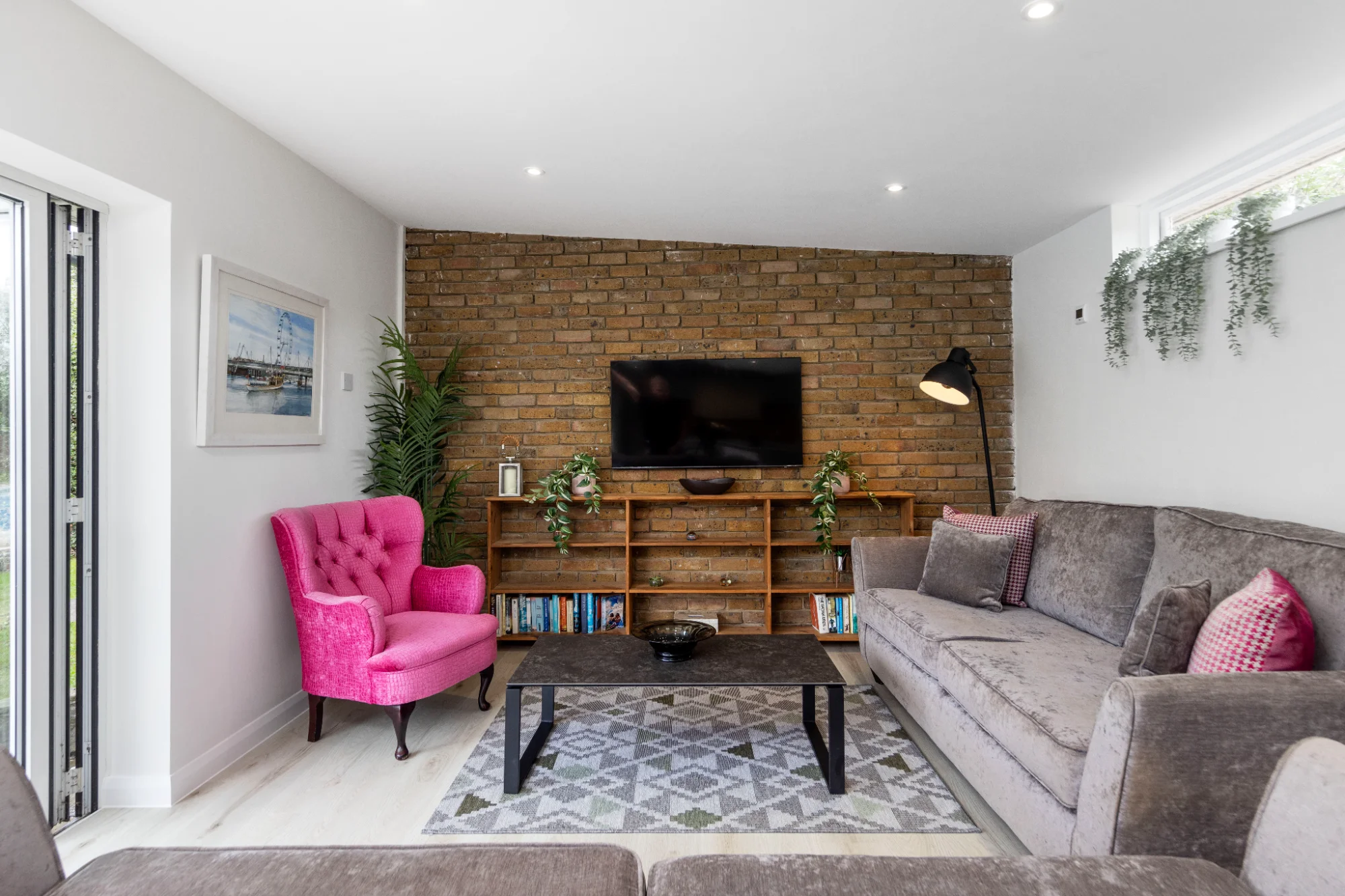 Living room with brick feature wall